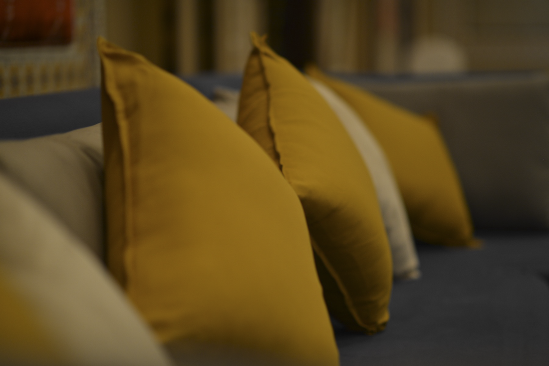 Close of of cushions in complimentary colours